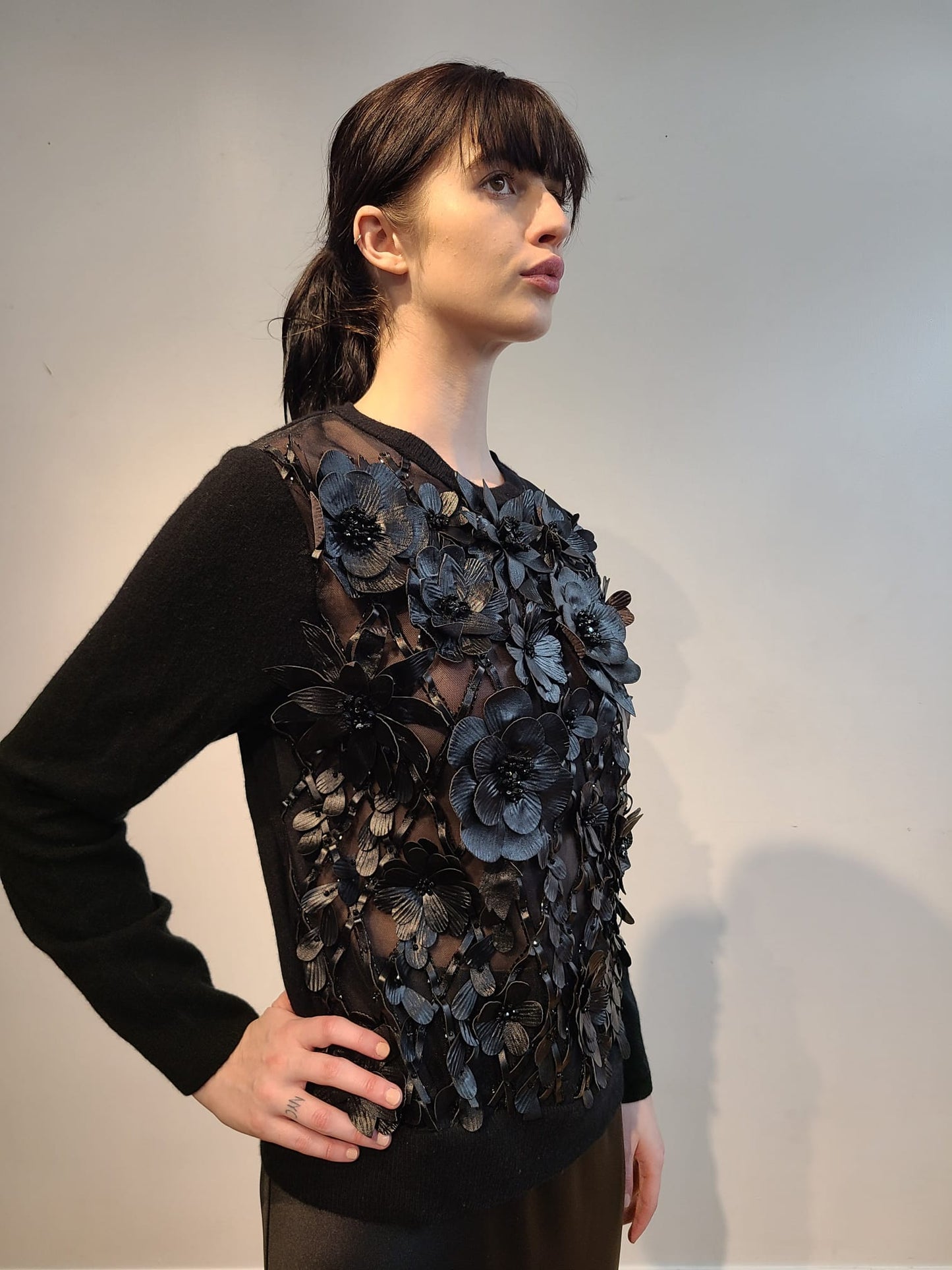 BLACK CASHMERE CREW NECK LONG SLEEVE WITH FRONT BLACK 3D VEGAN LEATHER FLOWERS WITH JET BEAD STERNUM ON BLACK SATIN PERGOLA ON BLACK TULLE (SIZE M)