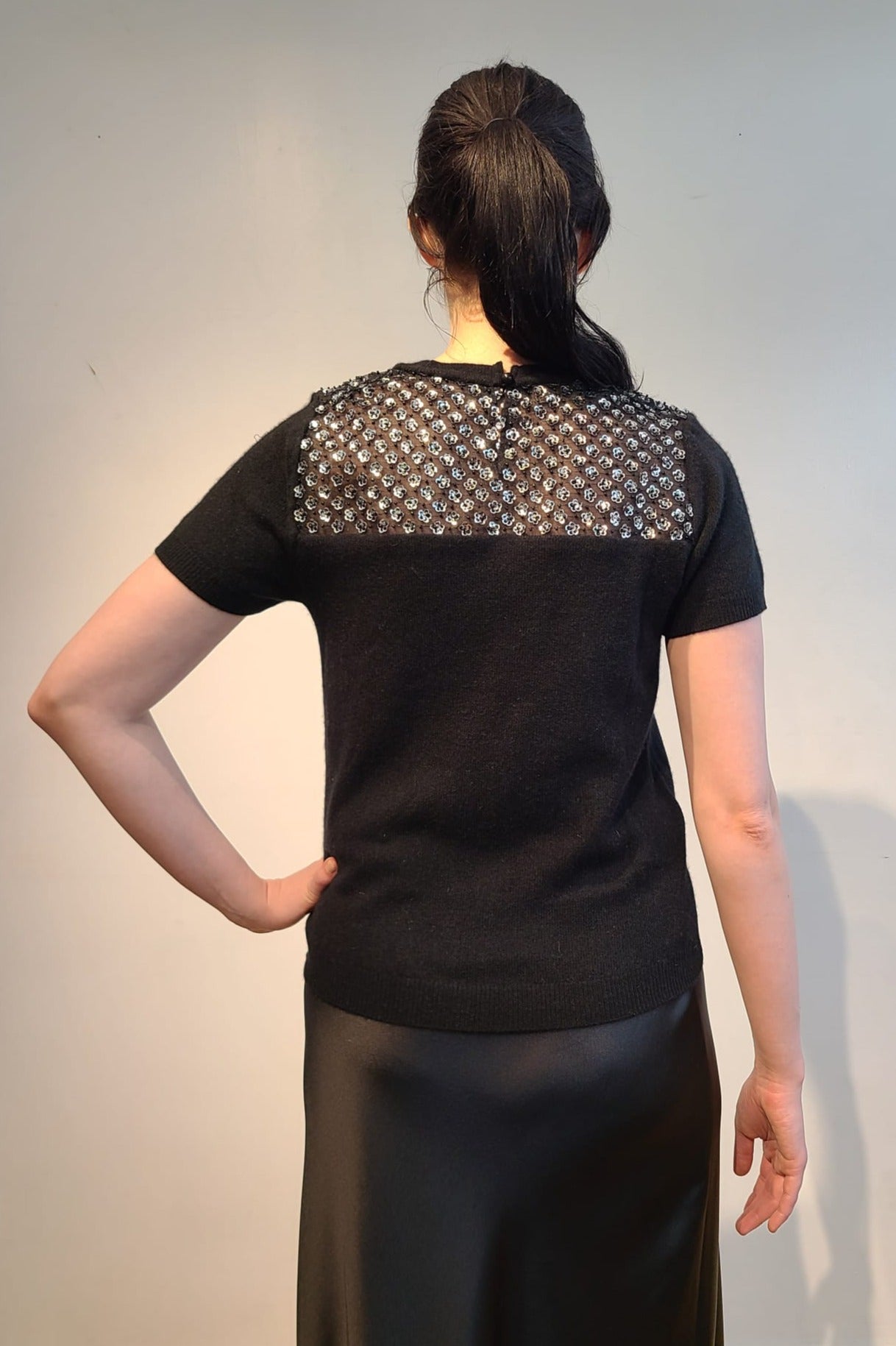 BLACK CASHMERE T SHIRT WITH PEEKABOO FRONT & BACK EMBELLISHED SILVER MICRO SEQUIN FLOWERS & JET BEADS ON BLACK TULLE (SIZE M)