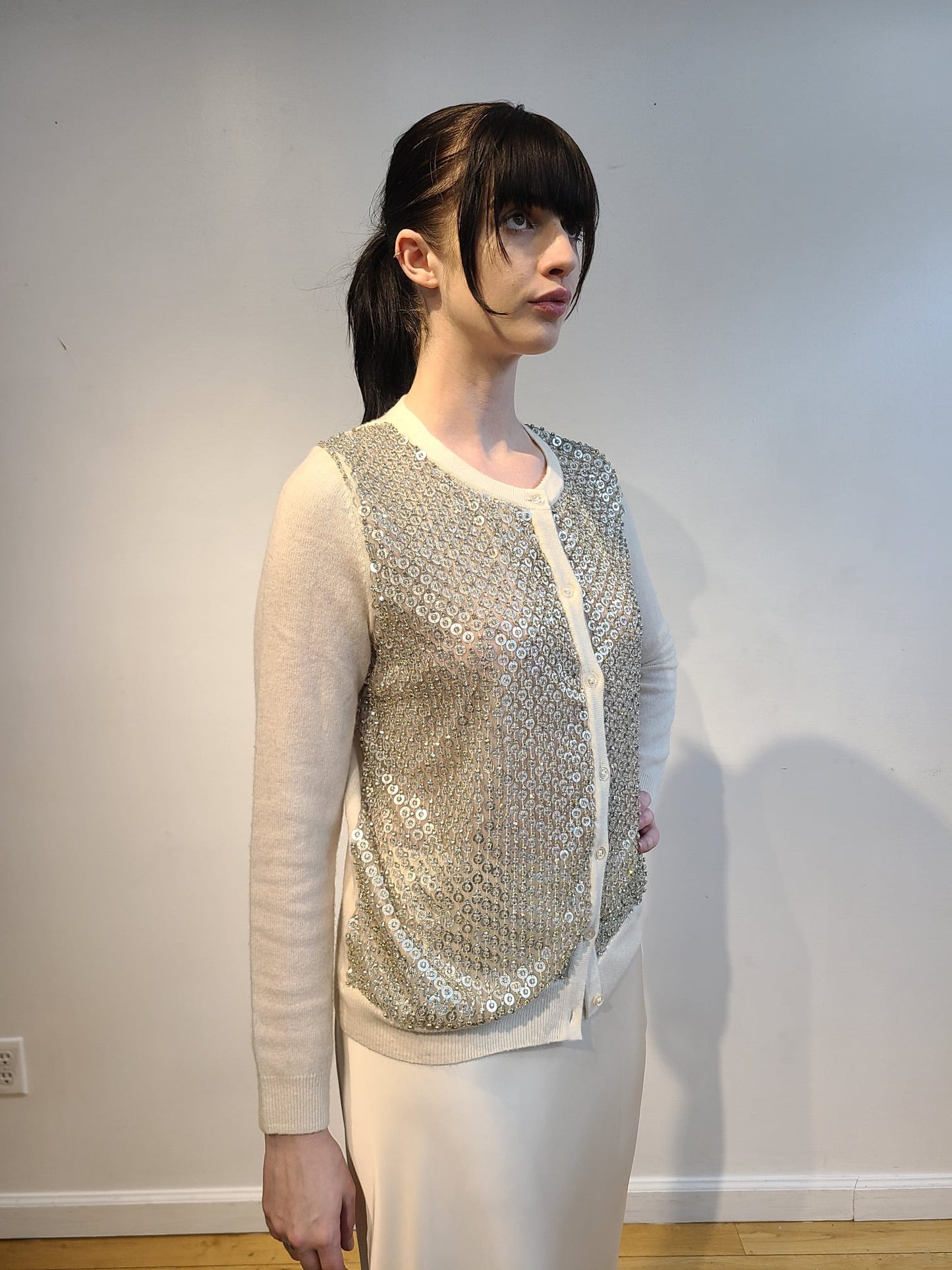WHITE CASHMERE LONG SLEEVE BUTTON FRONT CARDIGAN WITH FRONT EMBELLISHED FUTURISTIC SILVER DISCS & CRYSTAL BEADS ON DOVE GRAY TULLE(SIZE S)