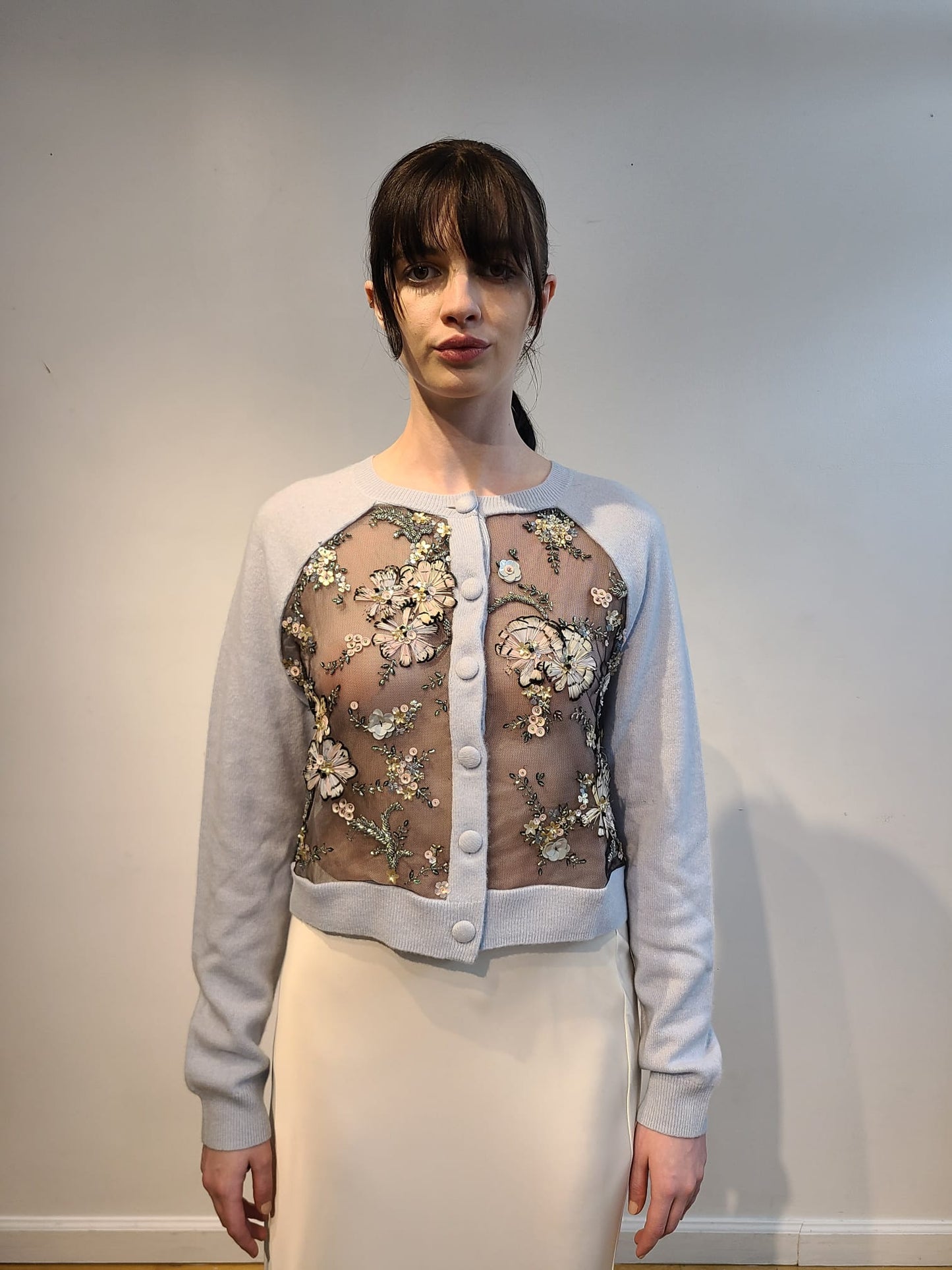 BABY BLUE CASHMERE CROP CARDIGAN WITH FRONT & BACK EMBELLISHED PASTEL FEATHER FLOWERS WITH ANTIQUE BEADING ON BLACK TULLE (SIZE M)