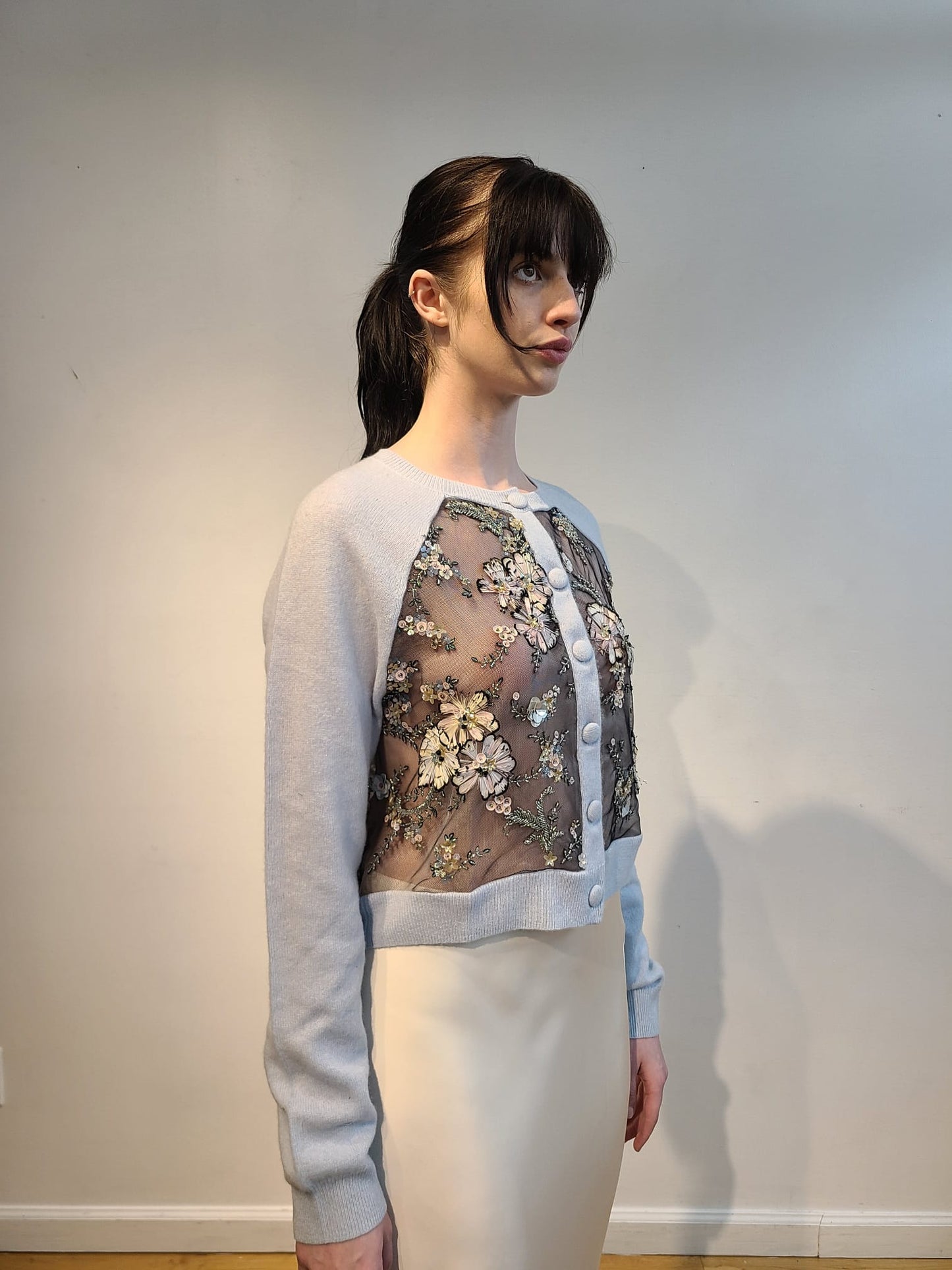 BABY BLUE CASHMERE CROP CARDIGAN WITH FRONT & BACK EMBELLISHED PASTEL FEATHER FLOWERS WITH ANTIQUE BEADING ON BLACK TULLE (SIZE M)