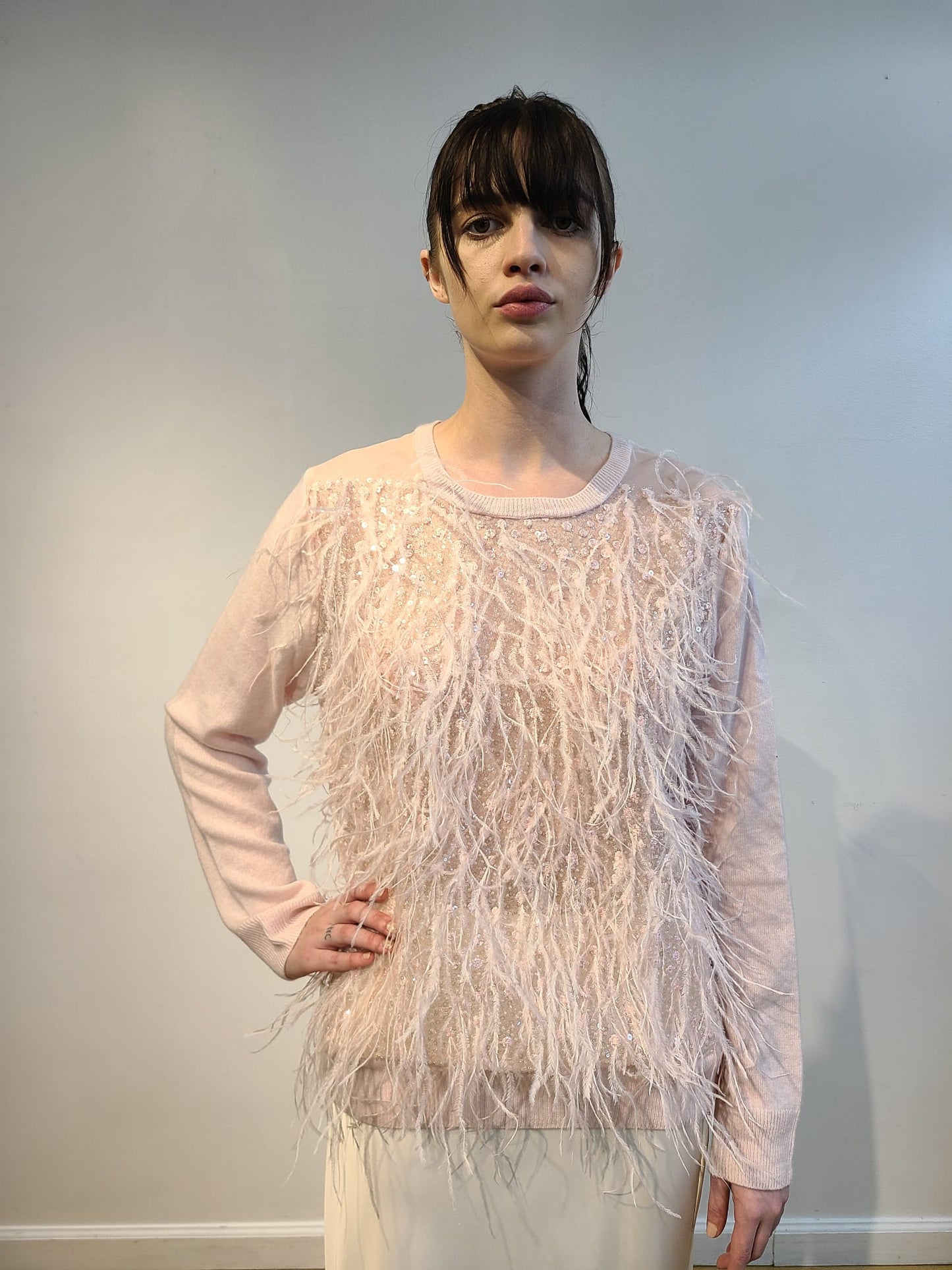 PINK CASHMERE CREW NECK LONG SLEEVE WITH FRONT EMBELLISHED PINK OPALESCENT SEQUINS & FEATHERS FLYING ON PINK TULLE(SIZE L)