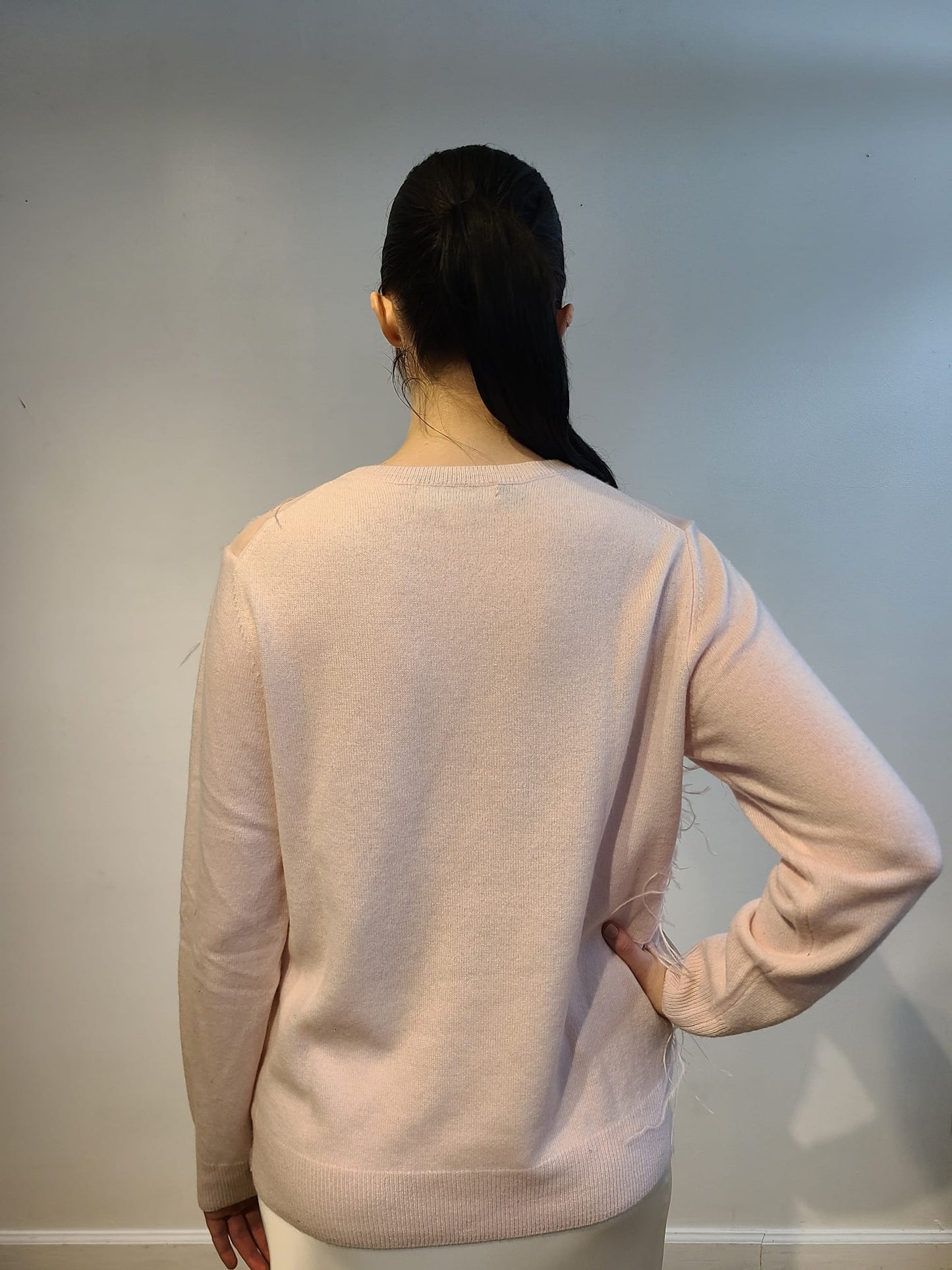 PINK CASHMERE CREW NECK LONG SLEEVE WITH FRONT EMBELLISHED PINK OPALESCENT SEQUINS & FEATHERS FLYING ON PINK TULLE(SIZE L)