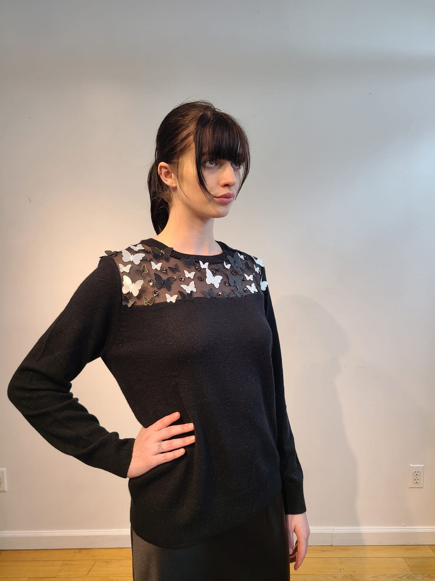 BLACK CASHMERE CREW NECK WITH PEEKABOO EMBELLISHED FRONT & BACK OF RAINING CRYSTALS & BLACK & WHITE 3D BUTTERFLIES WITH GOLD TRIM FLYING FREE (SIZE L)