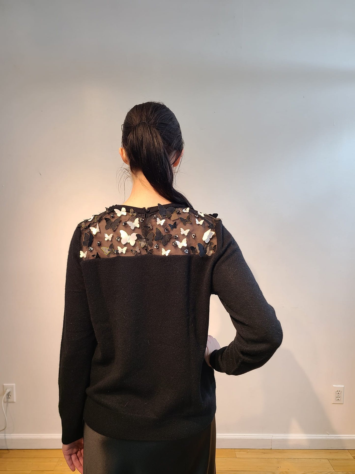 BLACK CASHMERE CREW NECK WITH PEEKABOO EMBELLISHED FRONT & BACK OF RAINING CRYSTALS & BLACK & WHITE 3D BUTTERFLIES WITH GOLD TRIM FLYING FREE (SIZE L)