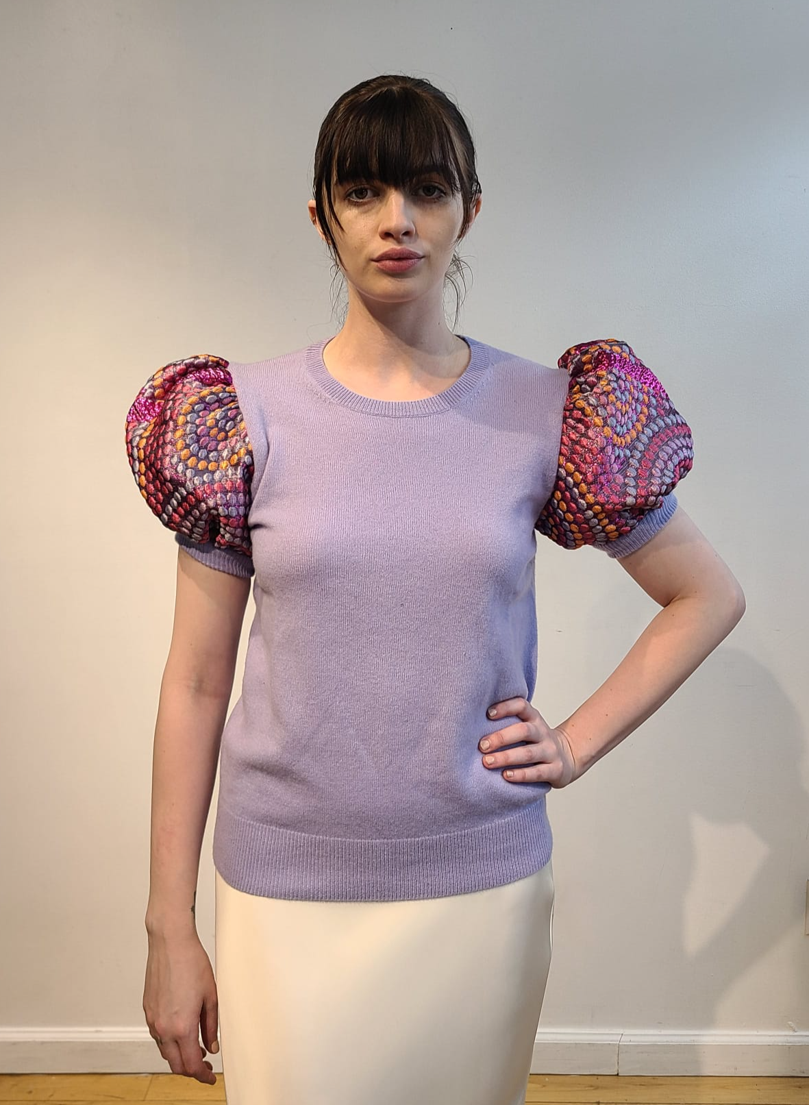 LAVENDER CASHMERE CREW NECK WITH SHORT VOLUMINOUS PUFF SLEEVE EMBELLISHED WITH PINK/CORAL/YELLOW AND LAVENDER FLOWERS ON BABY BLUE TULLE