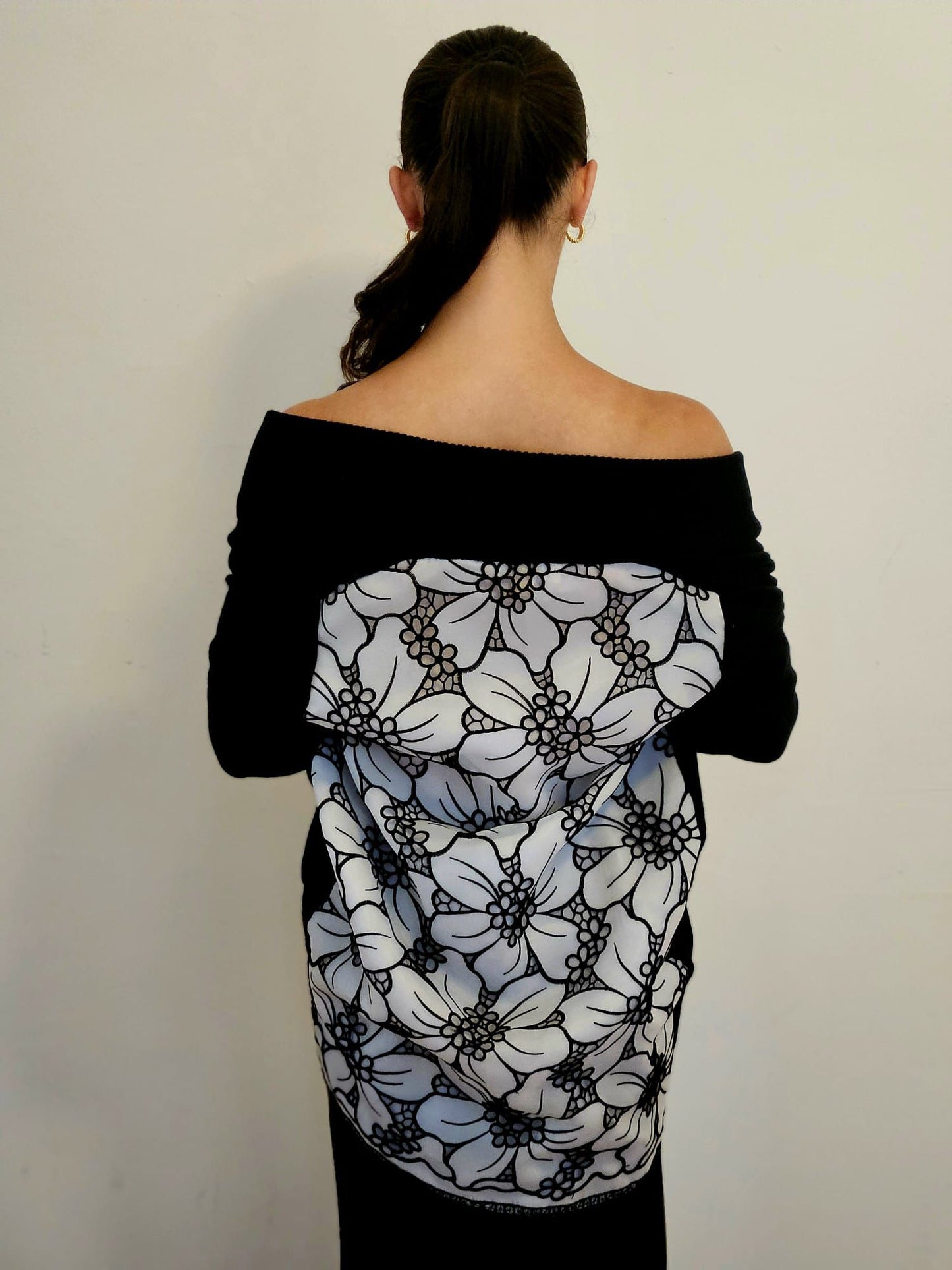 M/L BLACK CASHMERE LONG SLEEVE SWING CARDIGAN WITH WHITE SILK ORGANZA FLOWERS WITH BLACK OVERSTITCHED TRIM AND PETITE FLORAL CUTOUTS ON BACK