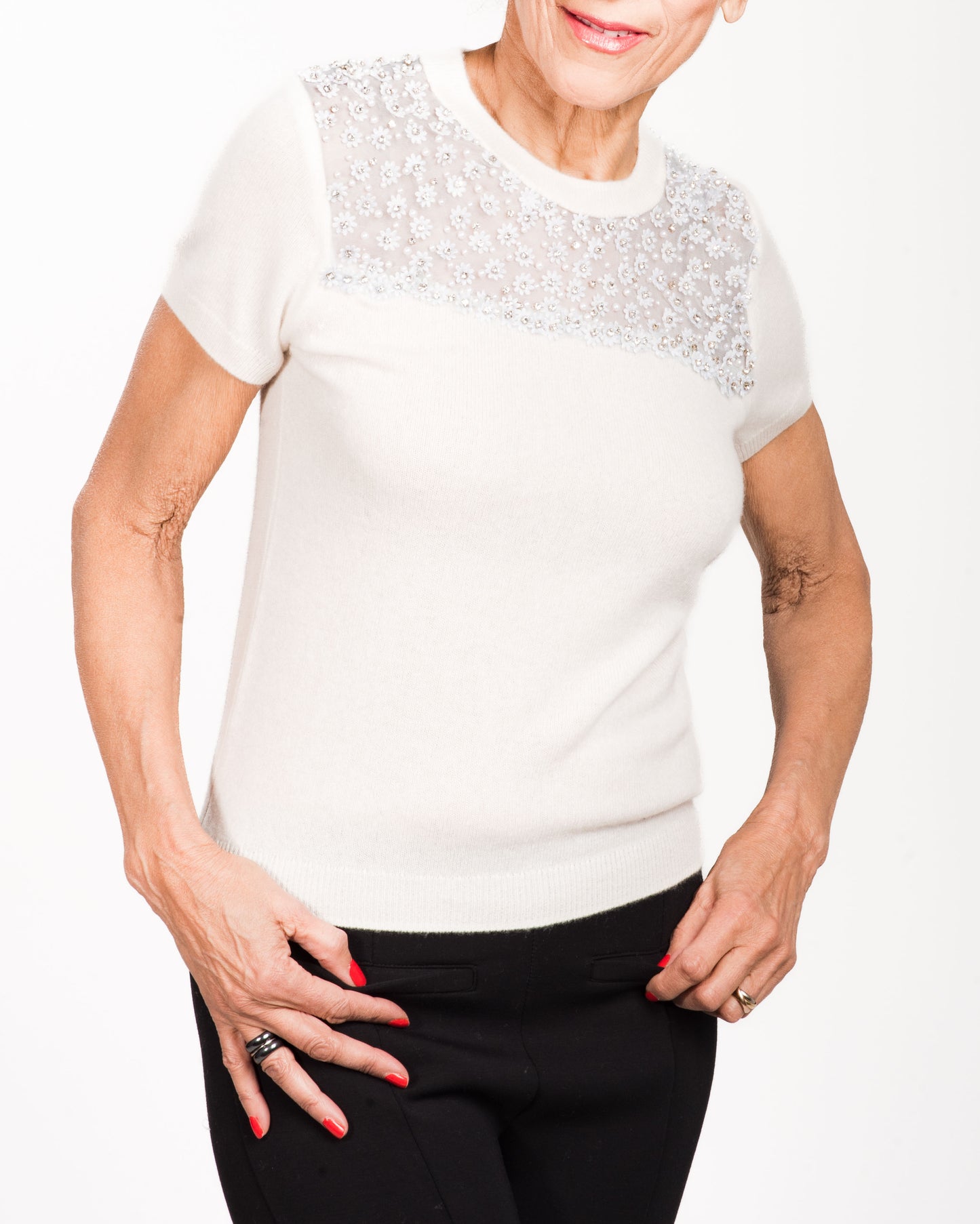SMALL WHITE SHORT SLEEVE CASHMERE PEEKABOO SWEATER WITH AQUA SILK ORGANZA BEADED WITH DAISIES PEARLS AND CRYSTALS WITH AQUA SILK ORGANZA LINING