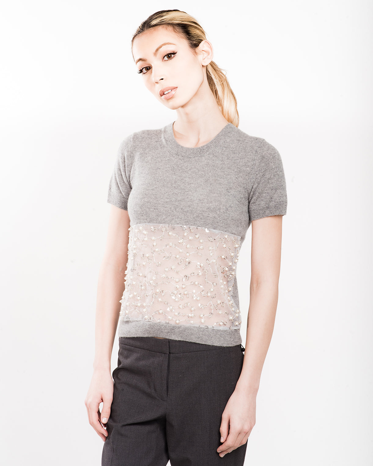 XS GREY SHORT SLEEVE CREW NECK CASHMERE SWEATER WITH FRONT WAIST PEEKABOO DETAIL OF PEARL, CRYSTAL AND MINI SEQUIN BEADING EMBROIDERED ON WHITE TULLE