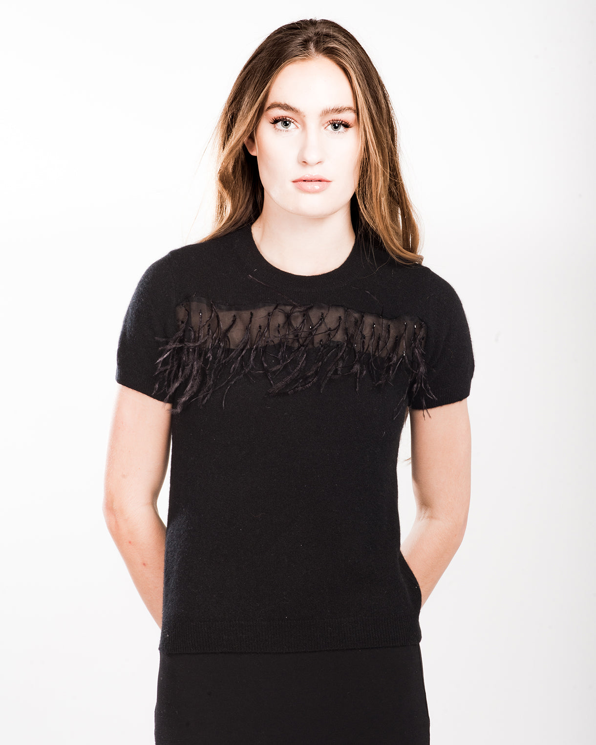 SMALL BLACK SHORT SLEEVE CREW NECK CASHMERE PEEKABOO SWEATER WITH BLACK TULLE ADORNED WITH BLACK FEATHERS AND JET BEADING