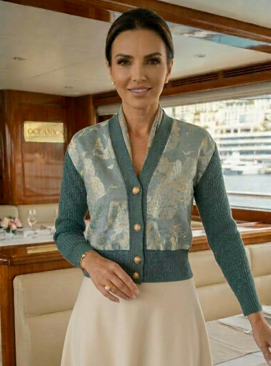 SMALL SPRUCE GREEN 100% ORGANIC COTTON FISHERMAN'S KNIT V-NECK CARDIGAN WITH GOLD BUTTONS AND WINTER WHITE AND FROSTED GOLD BROCADED FLOWERS ON FROSTY DAY AT MYSTIC LAKE ORGANZA FRONT PANELS LINED IN MISTY GREY SILK