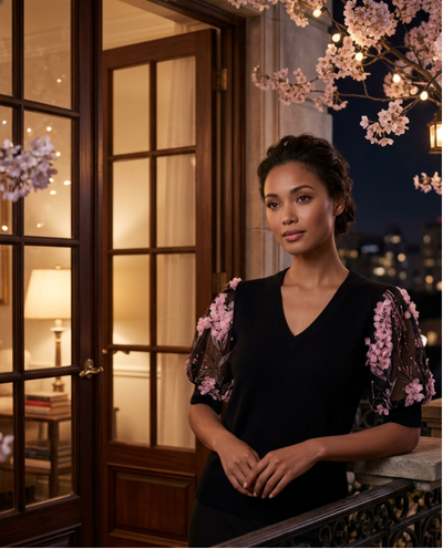 S BLACK 100% CASHMERE VNECK WITH SHORT PUFF SLEEVES OF PRETTY PINK CHERRY BLOSSOMS BLOWING IN BLACK TULLE SKY LINED WITH BLACK CHIFFON