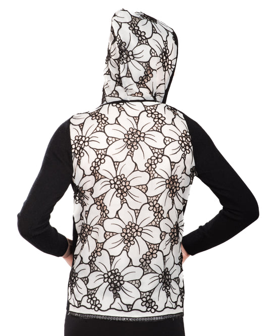 LARGE BLACK LONG SLEEVE CASHMERE HOODIE WITH WHITE SILK ORGANZA FLOWERS WITH BLACK OVERSTITCHED TRIM AND PETITE FLORAL CUTOUTS ON BACK AND HOOD