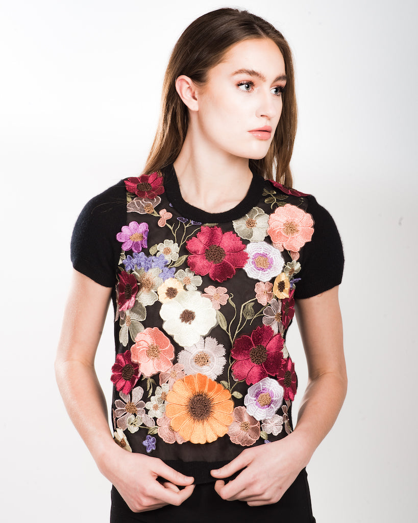 SMALL BLACK SHORT SLEEVE CREW NECK CASHMERE SWEATER WITH FIESTA COLORED MULTI-FLORAL SILK EMBROIDERED TULLE FRONT